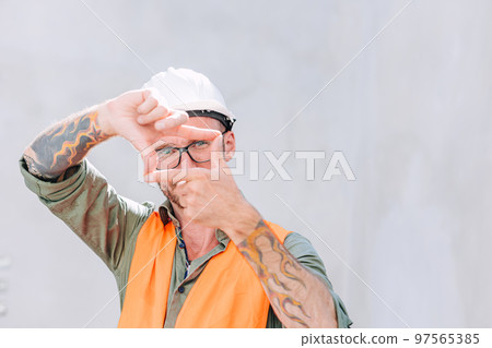 portrait smart middle age builder engineer worker male master skill artisan look with arm tattoo portrait smart middle age builder engineer worker male master skill artisan look with arm tattoo 97565385