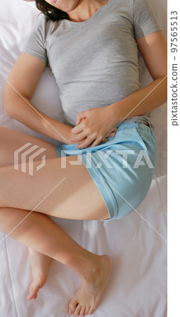 woman feel pain woman feel pain 97565513