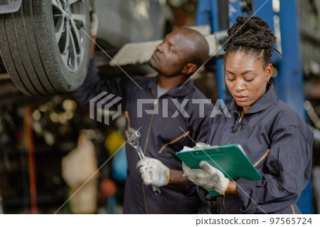 garage mechanic team working car auto service black african people professional worker together garage mechanic team working car auto service black african people professional worker together 97565724