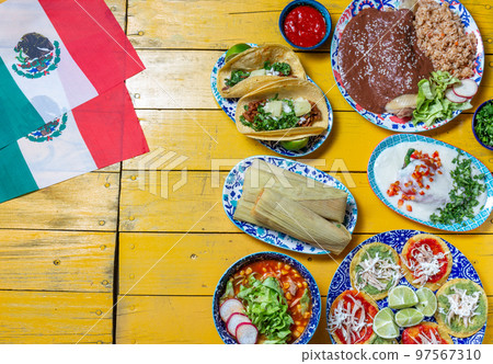 Mexican festive food for independence day independencia - around mexican flag. Top view , Yellow background. 97567310
