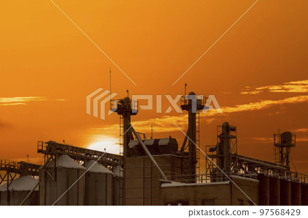 Industrial landscape at sunset time, stopped factory Industrial landscape at sunset time, stopped factory 97568429