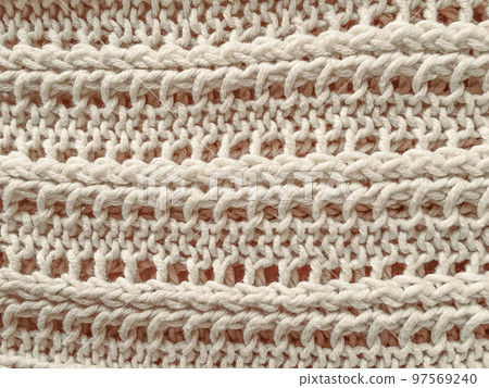 Handmade knitted background with detail woven threads. 97569240