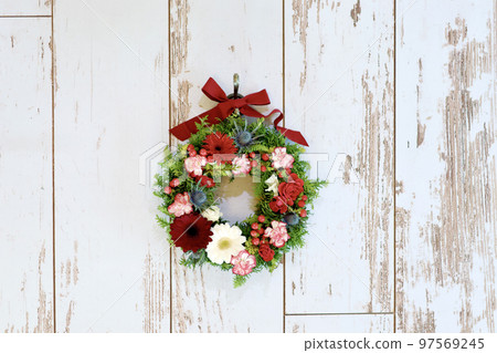 Handmade Christmas wreath Christmas wreath using fresh flowers Flower arrangement by wreath designer Handmade Christmas wreath Christmas wreath using fresh flowers Flower arrangement by wreath designer 97569245