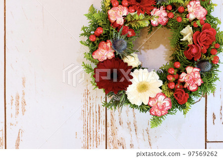 Handmade Christmas wreath Christmas wreath using fresh flowers Flower arrangement by wreath designer Handmade Christmas wreath Christmas wreath using fresh flowers Flower arrangement by wreath designer 97569262