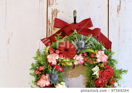 Handmade Christmas wreath Christmas wreath using fresh flowers Flower arrangement by wreath designer Handmade Christmas wreath Christmas wreath using fresh flowers Flower arrangement by wreath designer 97569264