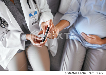 Pregnancy, diabetes and finger for blood test of sugar level, blood pressure and insulin check up. Medical care, doctor and hands of pregnant woman for healthcare exam and maternal wellness at home 97569377