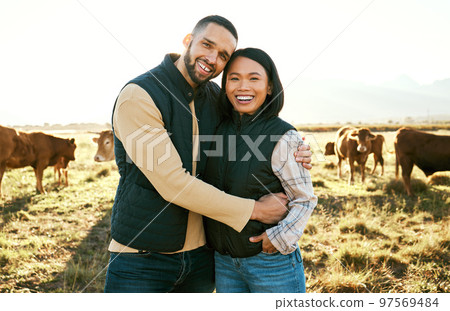 Cow, farm and couple portrait on field in countryside for meat, beef or cattle food industry. Happy people, man and woman farming livestock, cows or animals in agriculture, sustainability and ecology 97569484