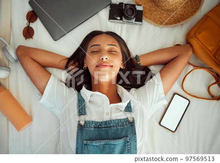 Top view, relax and woman sleeping on bed at hotel on vacation, holiday or trip. Phone mockup, travel dream and happy female in bedroom at motel, resort or lodge with camera, laptop and headphones Top view, relax and woman sleeping on bed at hotel on vacation, holiday or trip. Phone mockup, travel dream and happy female in bedroom at motel, resort or lodge with camera, laptop and headphones 97569513