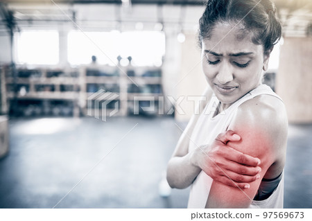 Woman, fitness and shoulder pain in gym for exercise workout, training accident and sports medical emergency. Sad athlete, arm injury and physical therapy, arthritis or muscle wellness in health club 97569673