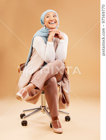 Happy, success and Muslim business woman with corporate joy, professional and Islamic fashion for work. Worker, career and happiness with senior employee in hijab, positive against studio background Happy, success and Muslim business woman with corporate joy, professional and Islamic fashion for work. Worker, career and happiness with senior employee in hijab, positive against studio background 97569770