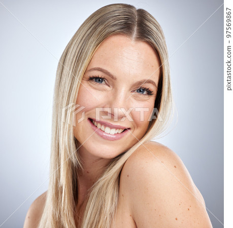 Portrait, hair care and woman with cosmetics, smile and organic products on grey studio background. Female, lady and head for soft, smooth and clean hair for confidence, treatment and natural beauty. Portrait, hair care and woman with cosmetics, smile and organic products on grey studio background. Female, lady and head for soft, smooth and clean hair for confidence, treatment and natural beauty. 97569867