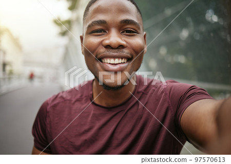 Fitness, portrait or black man taking a selfie in a city for social media marketing online content or running exercise blog. Face, pictures or happy African runner smiles with pride or freedom 97570613