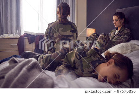 Army, mental health and depression woman in bedroom with bipolar thinking of trauma, stress and anxiety. Psychology, depressed and military hero or soldier experience insomnia, sleep problem or fear 97570856