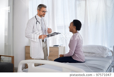 Consulting, medical and doctor with black woman in hospital for checklist, examination and therapy. Appointment, interview and help with healthcare worker listening to patient for physician checkup Consulting, medical and doctor with black woman in hospital for checklist, examination and therapy. Appointment, interview and help with healthcare worker listening to patient for physician checkup 97571047