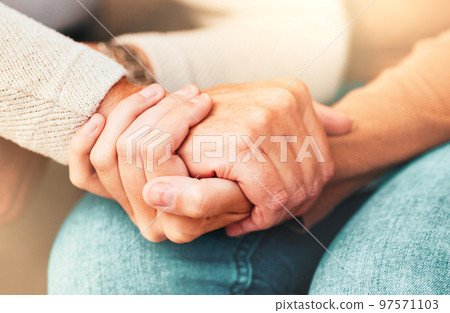Support, trust and hands, senior care in therapy or grief counseling session. Love, care and understanding between elderly and and caregiver. Hope, empathy and help in time of need for mental health. 97571103
