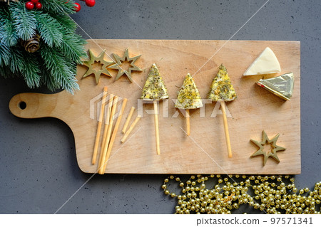 Top view of tree-shaped cheese snack 97571341