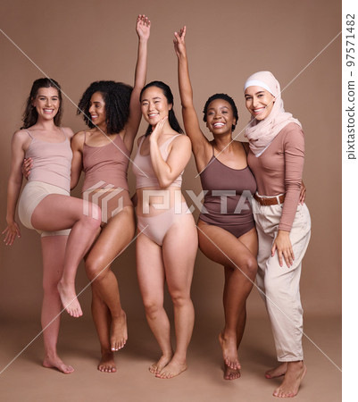Beauty, diversity and group of women in studio for wellness, fashion and body positivity on brown background. Self care, support and females celebrate natural skincare, self love and healthy skin Beauty, diversity and group of women in studio for wellness, fashion and body positivity on brown background. Self care, support and females celebrate natural skincare, self love and healthy skin 97571482