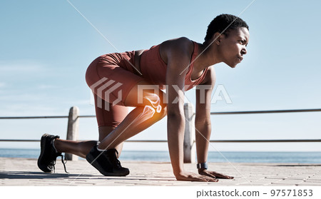 Black woman, fitness and runner with knee x ray in sports training, workout or exercise in the outdoors. Determined African American woman getting ready for running, race or sprint in motivation 97571853