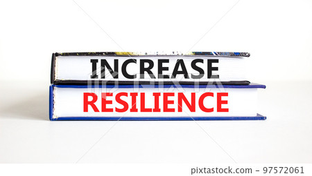 Increase resilience symbol. Concept word Increase resilience typed on books. Beautiful white table white background. Business and increase resilience concept. Copy space. 97572061