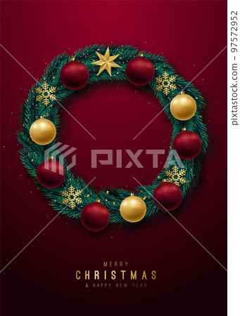 A wreath of Christmas tree branches with a red - Stock