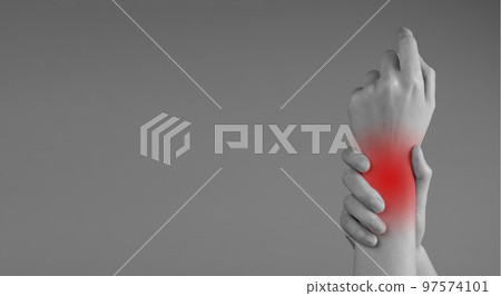 Banner with wrist pain. Woman holding painful hand with red point closeup. Sprain, fracture. Arthritis, chronic diseases. Health care, orthopedic problems and medicine concept. Copy space 97574101