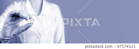 Banner with doctor holding white tooth. Implantation, oral hygiene, stomatology, caries and periodontal disease prevention, dental care concept. Copy space Banner with doctor holding white tooth. Implantation, oral hygiene, stomatology, caries and periodontal disease prevention, dental care concept. Copy space 97574121