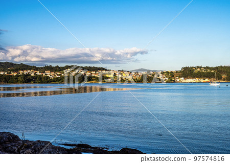 Fishing village of Combarro with the typical granary horreos. Galicia, Spain. Fishing village of Combarro with the typical granary horreos. Galicia, Spain. 97574816