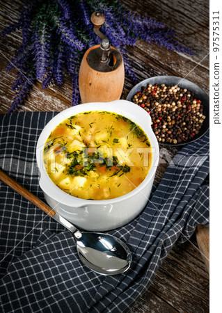 Barley soup with vegetables and chicken. Barley soup with vegetables and chicken. 97575311