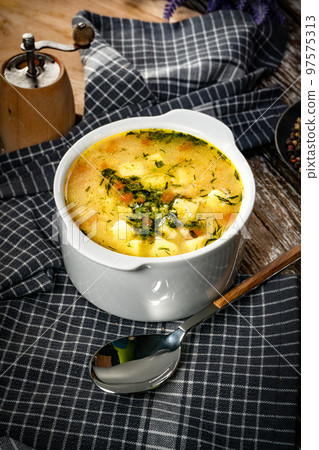 Barley soup with vegetables and chicken. Barley soup with vegetables and chicken. 97575313