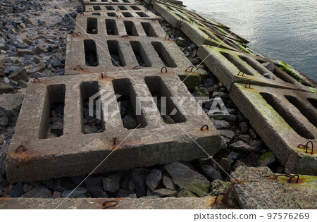 Coastal defense at the sea coast. Coastal defense at the sea coast. 97576269