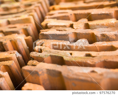 Orange roof tiles. Orange roof tiles. 97576270