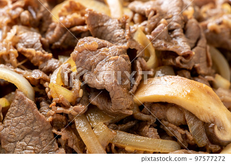 Stir-fried beef and king oyster mushrooms. 97577272