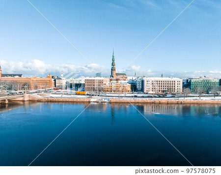 Aerial view of the winter Riga old town - the capital of Latvia. Beautiful winter over Riga. Aerial view of the winter Riga old town - the capital of Latvia. Beautiful winter over Riga. 97578075