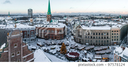 Beautiful Christmas market in the center of the old town in Riga, Latvia with a huge decorated Christmas tree. Beautiful Christmas market in the center of the old town in Riga, Latvia with a huge decorated Christmas tree. 97578124