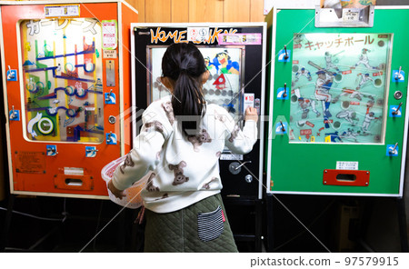 Elementary school students playing at a candy store Elementary school students playing at a candy store 97579915