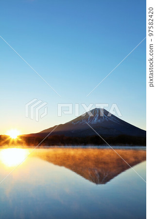 Mt. Fuji and the first sunrise Mt. Fuji and the first sunrise 97582420