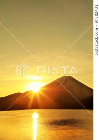 Mt. Fuji and the first sunrise Mt. Fuji and the first sunrise 97582431