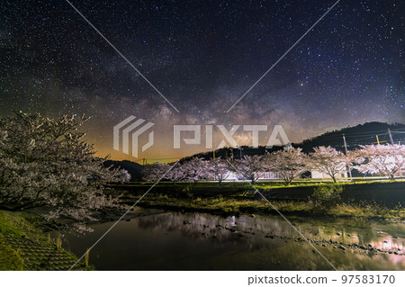 A spring starscape in the Chugoku Mountains, the Milky Way in the sky above the Senbonzakura of the Bihara River A spring starscape in the Chugoku Mountains, the Milky Way in the sky above the Senbonzakura of the Bihara River 97583170