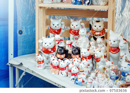 Goods displayed at the flea market 97583636