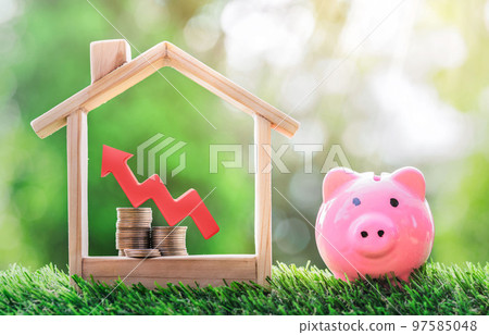 Coins with growth arrows are in the house and a Piggy bank on the grass. planning savings money of coins to buy a home. Coins with growth arrows are in the house and a Piggy bank on the grass. planning savings money of coins to buy a home. 97585048