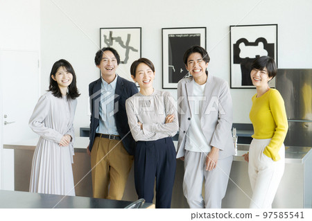 Five men and women lined up in the office Five men and women lined up in the office 97585541