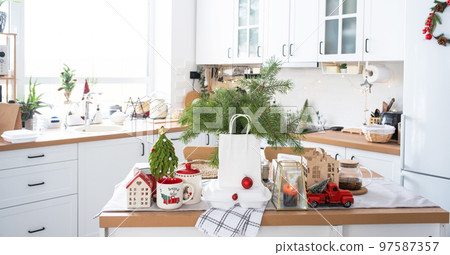 Food delivery service containers on table in white kitchen, festively served for celebration of Christmas and new year. Saving time, hot order, disposable plastic box, craft package. mock up Food delivery service containers on table in white kitchen, festively served for celebration of Christmas and new year. Saving time, hot order, disposable plastic box, craft package. mock up 97587357