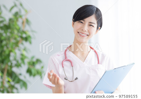 Medical image Portrait of a female doctor speaking looking at the camera Medical image Portrait of a female doctor speaking looking at the camera 97589155