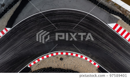 Aerial top view race kart track, Track for auto racing top view, Car race asphalt and curve grand prix street circuit, Aerial view asphalt race track. 97589401