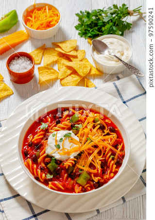 Black Bean Soup with spiral pasta and vegetables Black Bean Soup with spiral pasta and vegetables 97590241