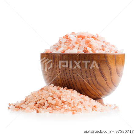 Pink himalayan salt in bowl isolated on white background. Pink himalayan salt in bowl isolated on white background. 97590717