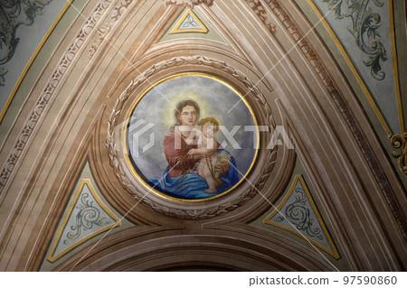 Virgin Mary with baby Jesus, ceiling fresco in the church of St. Victor on the Fishermen Island, one of the famous Borromeo Islands of Lake Maggiore, Italy Virgin Mary with baby Jesus, ceiling fresco in the church of St. Victor on the Fishermen Island, one of the famous Borromeo Islands of Lake Maggiore, Italy 97590860