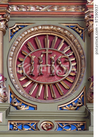 IHS sign on the altar in the Basilica of the Sacred Heart of Jesus in Zagreb, Croatia 97590937