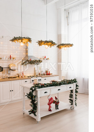 Beautiful new year christmas decor in scandinavian home kitchen interior 97591016