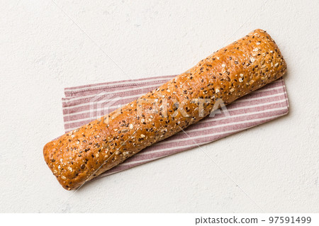 fresh crunchy french baguette on colored table. Top view Bakery products fresh crunchy french baguette on colored table. Top view Bakery products 97591499